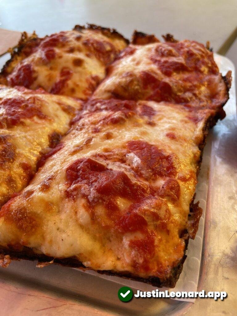 Closeup of Fly Bye Detroit Style Cheese Pizza